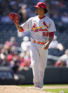 St. Louis Cardinals relief pitcher Genesis Cabrera calls for a new ball after giving up a solo home run to Colorado Rockies' Ryan McMahon in the seventh inning of a baseball game Thursday, Aug. 11, 2022, in Denver. (AP Photo/David Zalubowski)