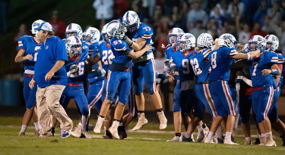 West Holmes celebrates beating Wooster in 2021.