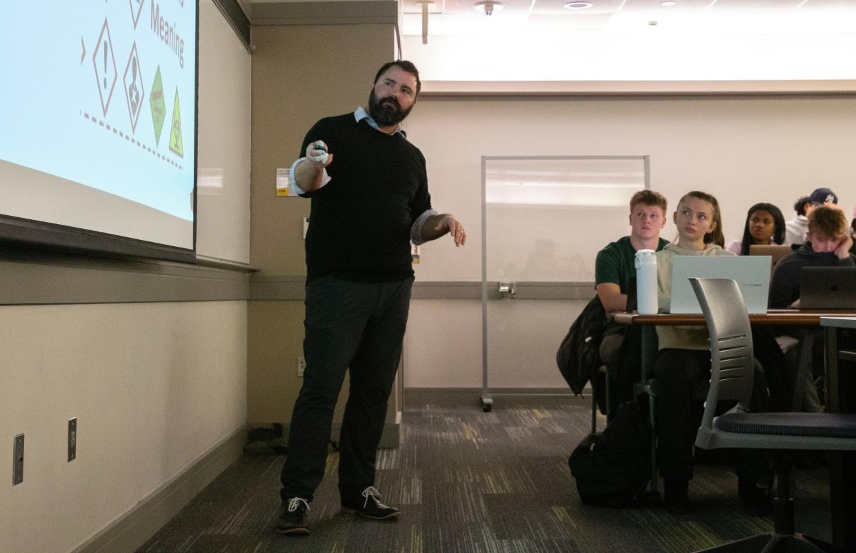 Cameron Ellis teaches a Principles of Risk Management class at the University of Iowa.