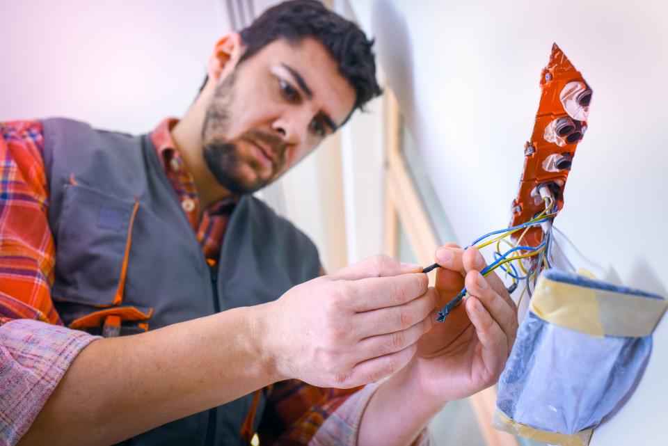 Worker performing home repairs.