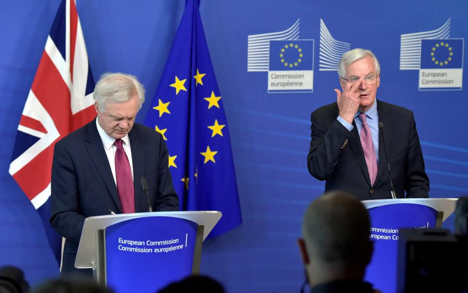 The European Union's chief Brexit negotiator Michael Barnier welcomes Britain's Secretary of State for Exiting the European Union David Davis ahead of their first day of talks in Brussels - Credit: Eric Vidal/ REUTERS