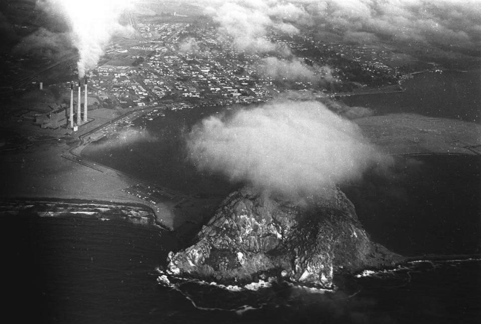 Aerial of Morro Rock, power plant and harbor from August 29, 1963.
