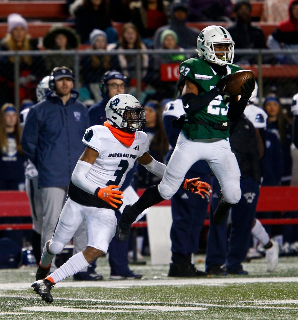 DePaul's A'khoury Lyde intercepts a pass intended for Mater Dei's Clarence Lewis in the NJSIAA Group III Non-Public Championship at SHI Stadium in Piscataway, N.J., in 2019.