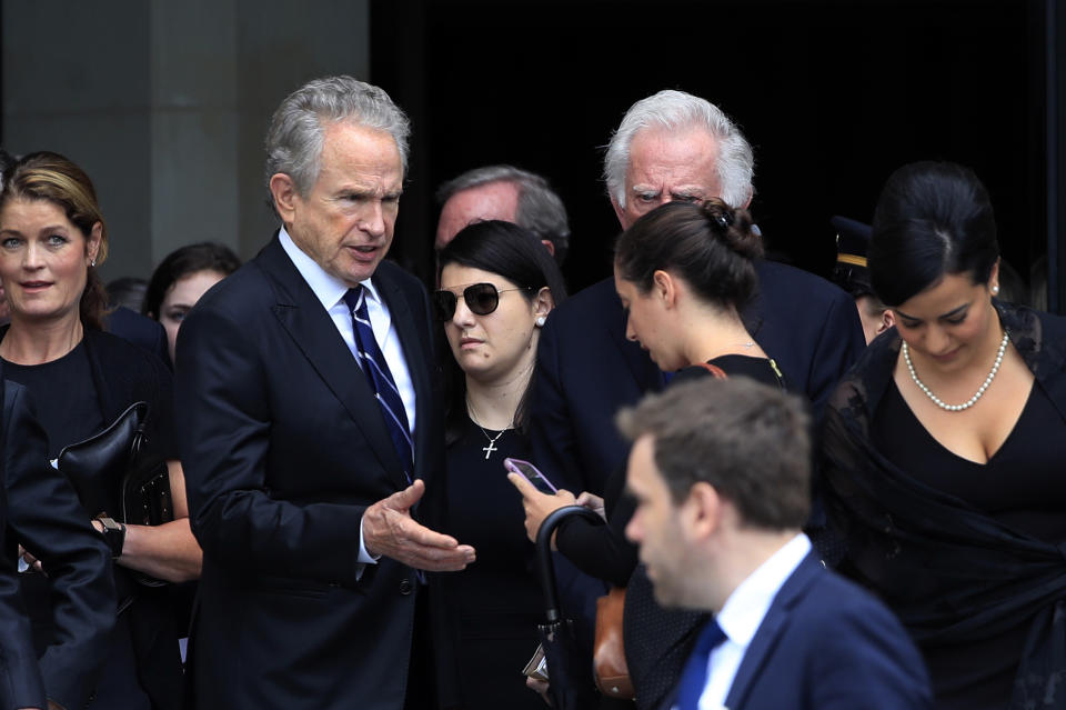 Actor Warren Beatty greets guests following a memorial service for Sen. John McCain, R-Ariz., at the Washington National Cathedral in Washington, Saturday, Sept. 1, 2018. (AP Photo/Manuel Balce Ceneta)