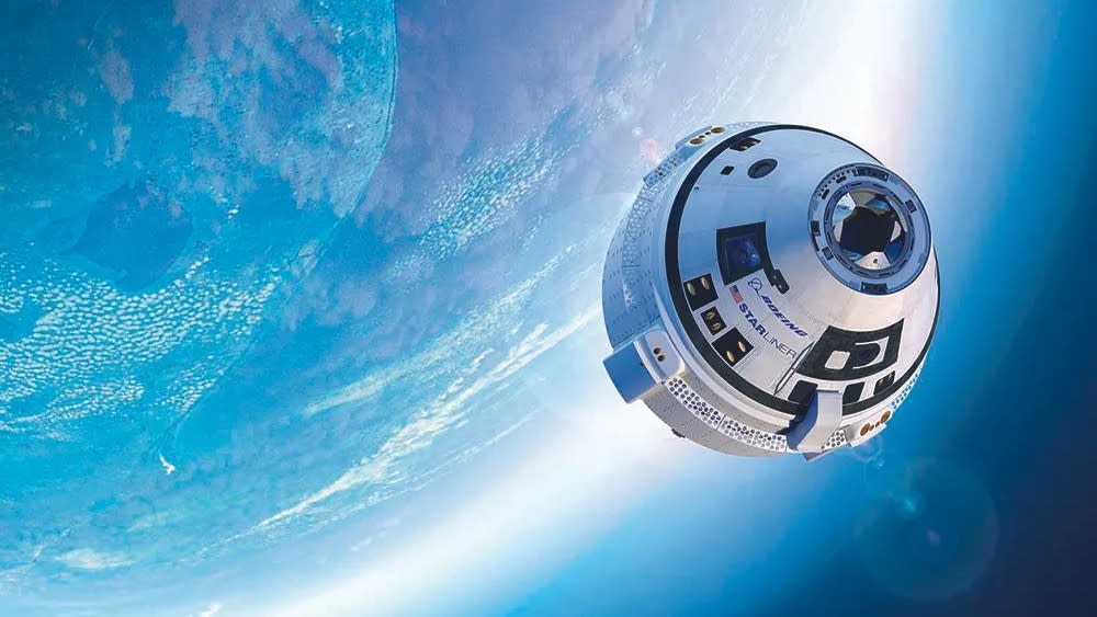  An artist's rendition shows Boeing's CST-100 Starliner heading for a rendezvous with the International Space Station. 