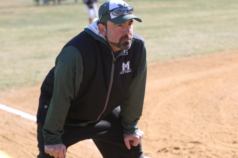 Montville Softball Coach, John Immediato, is shown while coaching at third base.  Monday, April, 1, 2019