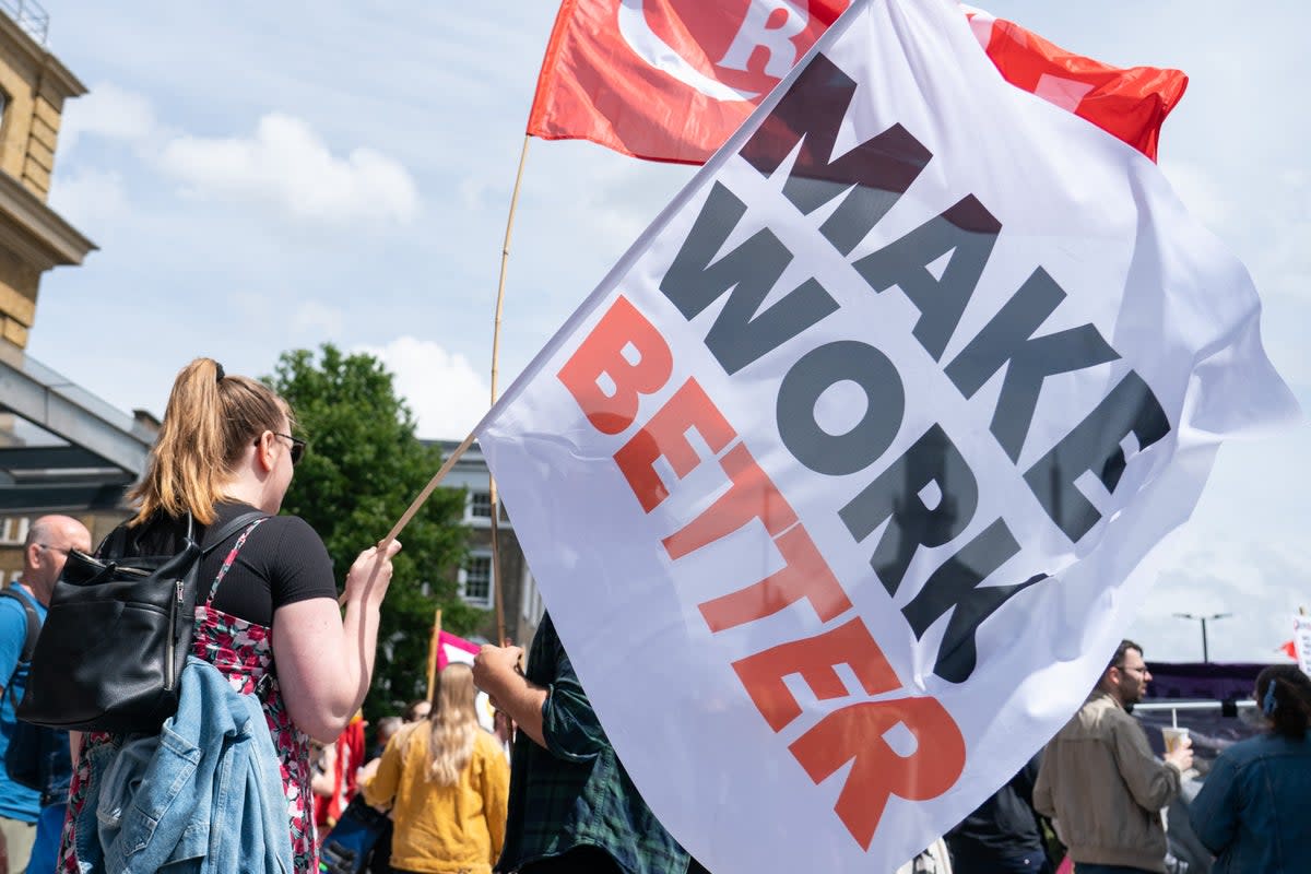 Protesters attend a rally outside King’s Cross station, London (Dominic Lipinski/PA) (PA Wire)