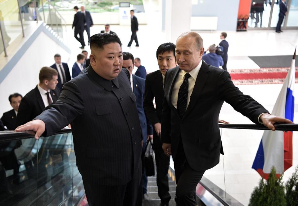 Vladimir Putin and Kim Jong-un meet at the Far Eastern Federal University campus on the Russky Island in Vladivostok (EPA)