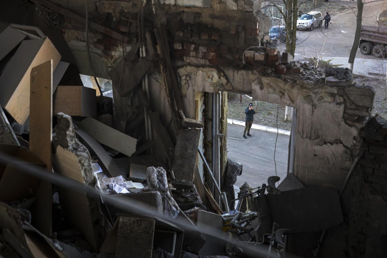 A damaged part of the hospital of Donetsk Clinical Territorial Medical Association is seen after what Russian officials in Donetsk said it was a shelling by Ukrainian forces, in Donetsk, in Russian-controlled Donetsk region, Ukraine, Tuesday, Dec. 20, 2022. (AP Photo/str)