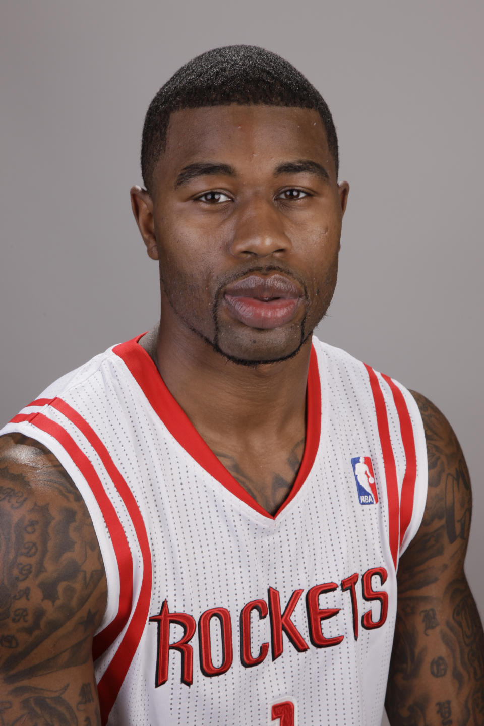 FILE - Houston Rockets' Terrence Williams poses for a photo during their NBA basketball media day in Houston, in this Thursday, Dec. 15, 2011, file photo. Eighteen former NBA players, including Williams, have been indicted on charges alleging they defrauded the league's health and welfare benefit plan out of about $4 million, according to an indictment Thursday, Oct. 7, 2021. (AP Photo/David J. Phillip, File)