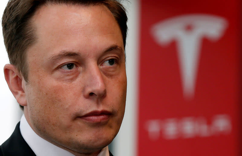 Tesla Motors Inc Chief Executive Elon Musk pauses during a news conference in Tokyo September 8, 2014. REUTERS/Toru Hanai/File Photo