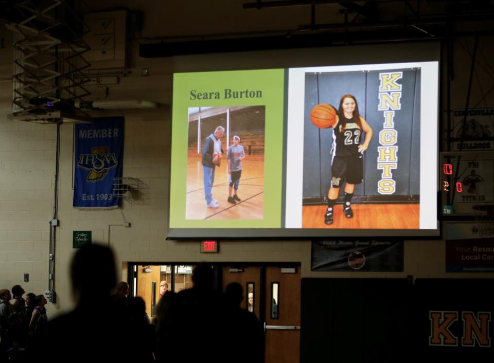 A slideshow plays during Northeastern's ceremony honoring Seara Burton Dec. 2, 2022.