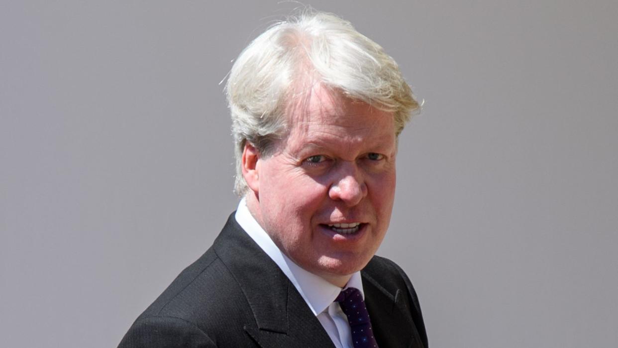 Charles Spencer in a black suit at Prince Harry's wedding