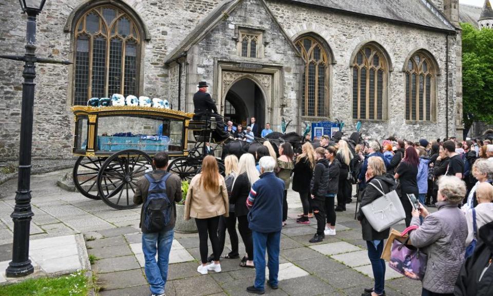 The funeral procession arrives at St Andrew’s church.