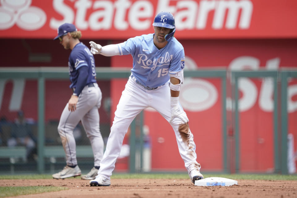 Kansas City Royals' Whit Merrifield (15) celebrates after his double in the first inning against the Tampa Bay Rays during a baseball game Sunday, July 24, 2022, in Kansas City, Mo. (AP Photo/Ed Zurga)