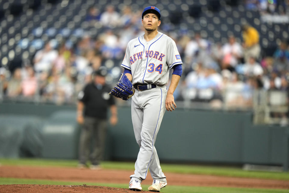 New York Mets starting pitcher Kodai Senga, from Japan, prepares to throw during the first inning of a baseball game against the Kansas City Royals Wednesday, Aug. 2, 2023, in Kansas City, Mo. (AP Photo/Charlie Riedel)