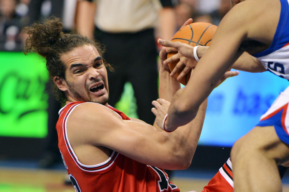 PHILADELPHIA, PA - MAY 04: Joakim Noah #13 of the Chicago Bulls looks to pass the ball during the game against the Philadelphia 76ers in Game Three of the Eastern Conference Quarterfinals in the 2012 NBA Playoffs at the Wells Fargo Center on May 4, 2012 in Philadelphia, Pennsylvania. NOTE TO USER: User expressly acknowledges and agrees that, by downloading and or using this photograph, User is consenting to the terms and conditions of the Getty Images License Agreement. (Photo by Drew Hallowell/Getty Images)