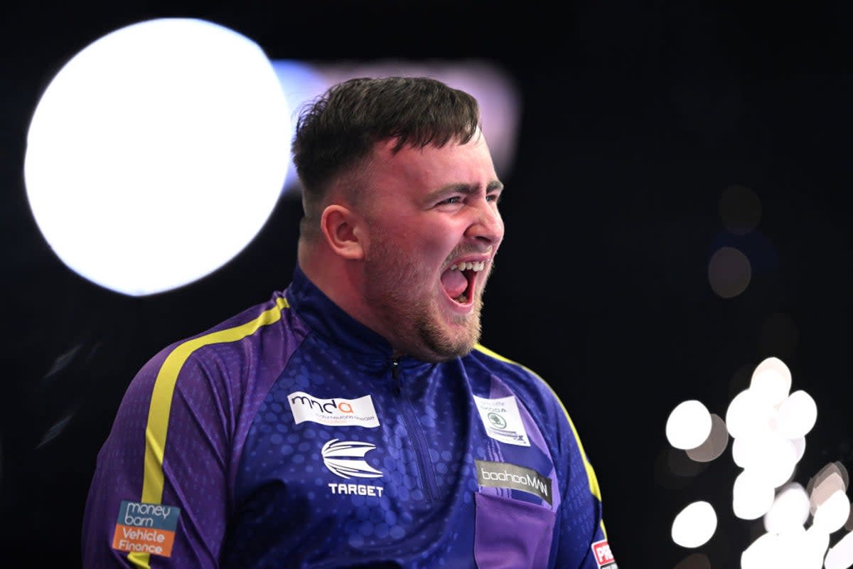 Luke Littler roars after winning the Premier League final  (Getty Images)