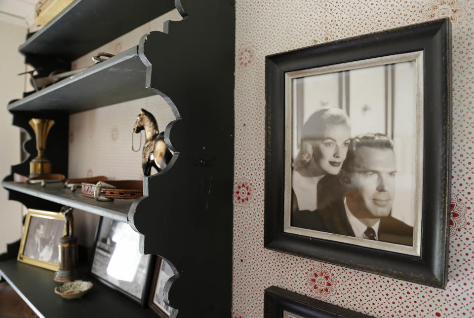 In this photo taken March 15, 2013, a photograph of actor Fred MacMurray and his actress wife June Haver hangs in an upstairs room of MacMurray's home at the MacMurray Ranch in Healdsburg, Calif. The former cattle ranch, which was purchased in 1941 by the actor in the popular TV series "My Three Sons," now produces wine and is owned by the Gallo wine family. (AP Photo/Eric Risberg)