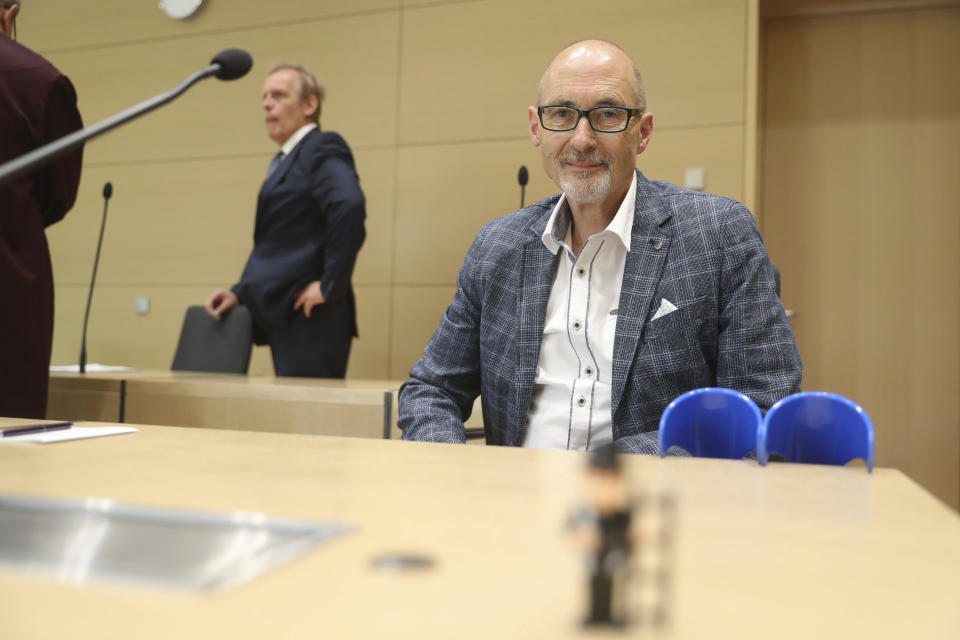 Plaintiff Herbert Gilbert, owner of a VW Diesel passenger car, sits in the courtroom of the Federal Court of Justice (BGH) prior to the verdict in the trial between him and the Volkswagen company in Karlsruhe, Germany, Monday, May 25, 2020. According to the ruling, Volkswagen is basically obliged to pay damages to car owners affected by the diesel scandal. (Thorsten Gutschalk/Pool/dpa via AP)