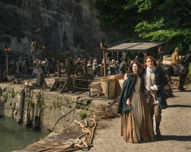 Christmas came early for <em> Outlander</em> fans! Starz’s hourlong drama won’t return with brand-new episodes for a while – 2016 to be exact – but during its Comic-Con panel on Saturday, fans were treated to their very first look at the anticipated 13-episode second season and a special blooper reel from season one. <strong>PHOTOS: The Stars Hit Up Comic-Con 2015!</strong> As a refresher, here is the synopsis of what’s to come: <em>The new season opens with Claire and Jamie arriving in France, hell-bent on infiltrating the Jacobite rebellion led by Prince Charles Stuart, and stopping the battle of Culloden. With the help of his cousin Jared, Jamie and Claire are thrown into the extravagant world of French society – where parties are abundant, but political gain is far less fruitful. Altering the course of history may present challenges that begin to weigh on the very fabric of their relationship. Armed with the knowledge of what lies ahead, Claire and Jamie must race to prevent a doomed Highland uprising – and the extinction of Scottish life as they know it.</em> <strong>WATCH: Uh-Oh! Claire Has a Problem Being Jamie's 'Lady' on 'Outlander'</strong> Below are the three photos unveiled for season two: Don’t <em>Outlander</em> stars <strong>Caitriona Balfe </strong>and <strong>Sam Heughan</strong> look gorgeous in their Parisian garb? But no <em>Outlander</em> panel would be complete without laughs – and they sure delivered, bringing a blooper reel from season one that makes us love the cast that much more! Watch the epic gag reel above. Starz Starz Starz <em> Outlander </em>has added a slew of new cast members for season two, including <strong>Louise de Rohan </strong>(Claire Sermonne), <strong>Laurence Dobiesz</strong> (Alexander Randall), <strong>Marc Duret</strong> (Monsieur Joseph Duverney), <strong>Margaux Chatelier</strong> (Annalise de Marillac), <strong>Andrew Gower</strong> (Bonnie Prince Charlie), <strong>Rosie Day</strong> (Mary Hawkins), <strong> Dominique Pinon</strong> (Master Raymond) and <strong>Stanley Weber</strong> (Le Comte St. Germain). <em> Outlander</em> returns for season two in 2016 on Starz.