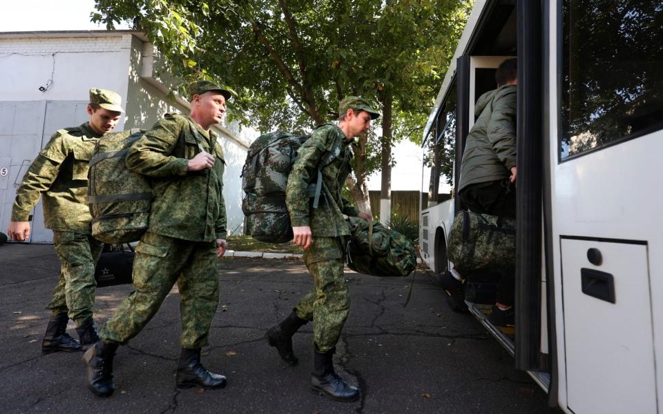 Russian recruits take a bus near a military recruitment center in Krasnodar, Russia - AP