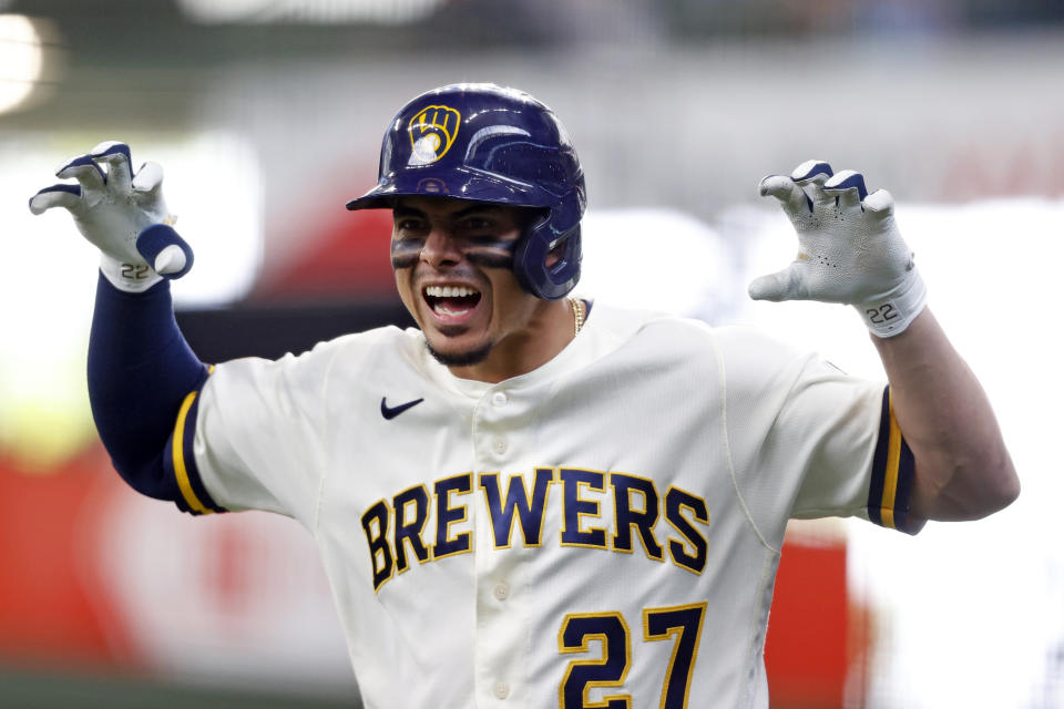 Milwaukee Brewers' Willy Adames reacts after hitting a run-scoring single during the fifth inning of a baseball game against the San Diego Padres, Thursday, May 27, 2021, in Milwaukee. (AP Photo/Jeffrey Phelps)