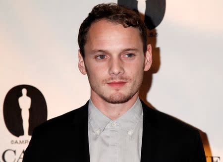 Actor Anton Yelchin poses during ceremonies for the Academy of Motion Picture Arts & Sciences Nicholl Fellowships in Screenwriting awards in Beverly Hills November 7, 2013. REUTERS/Fred Prouser/File Photo