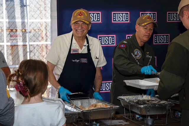 <p>U.S. Navy photo by Mass Communication Specialist 3rd Class Leah Moore</p> Drew Carey serving Thanksgiving meals to the crew assigned to USS George H.W. Bush in November 2023