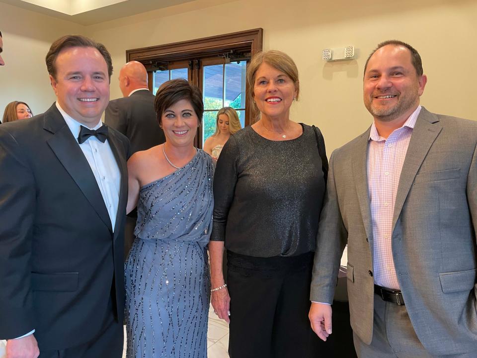 Scott Henderson, school board Member Betsy Henderson, Knox County Commissioner Terry Hill, and Hardin Valley Academy Athletics Council president Paul Rome attend the first HVAAC Gala at Bridgewater Place Saturday, Aug. 27, 2022.