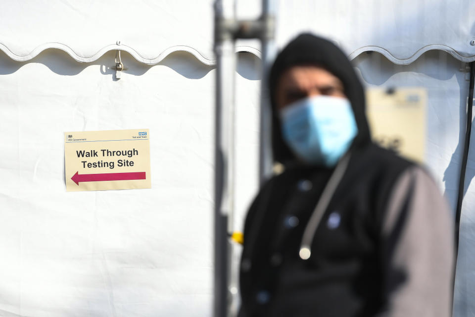 People queue up outside a coronavirus testing centre offering walk-in appointments in north London. (Photo by Kirsty O'Connor/PA Images via Getty Images)