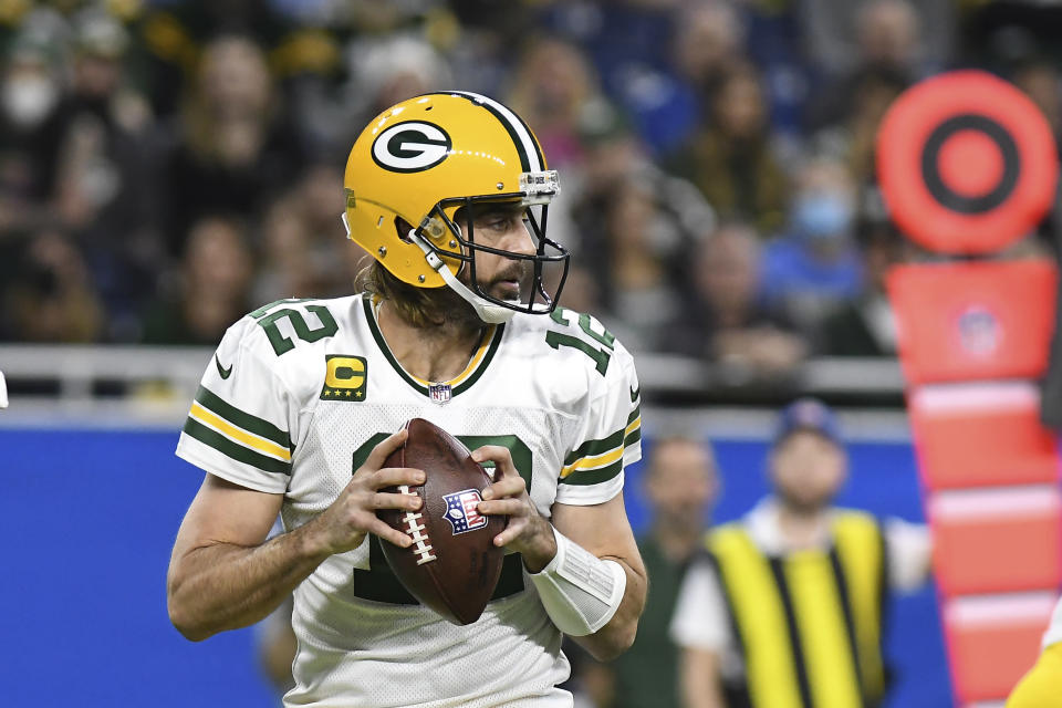 Green Bay Packers quarterback Aaron Rodgers looks downfield during the first half of an NFL football game against the Detroit Lions, Sunday, Jan. 9, 2022, in Detroit. (AP Photo/Lon Horwedel)