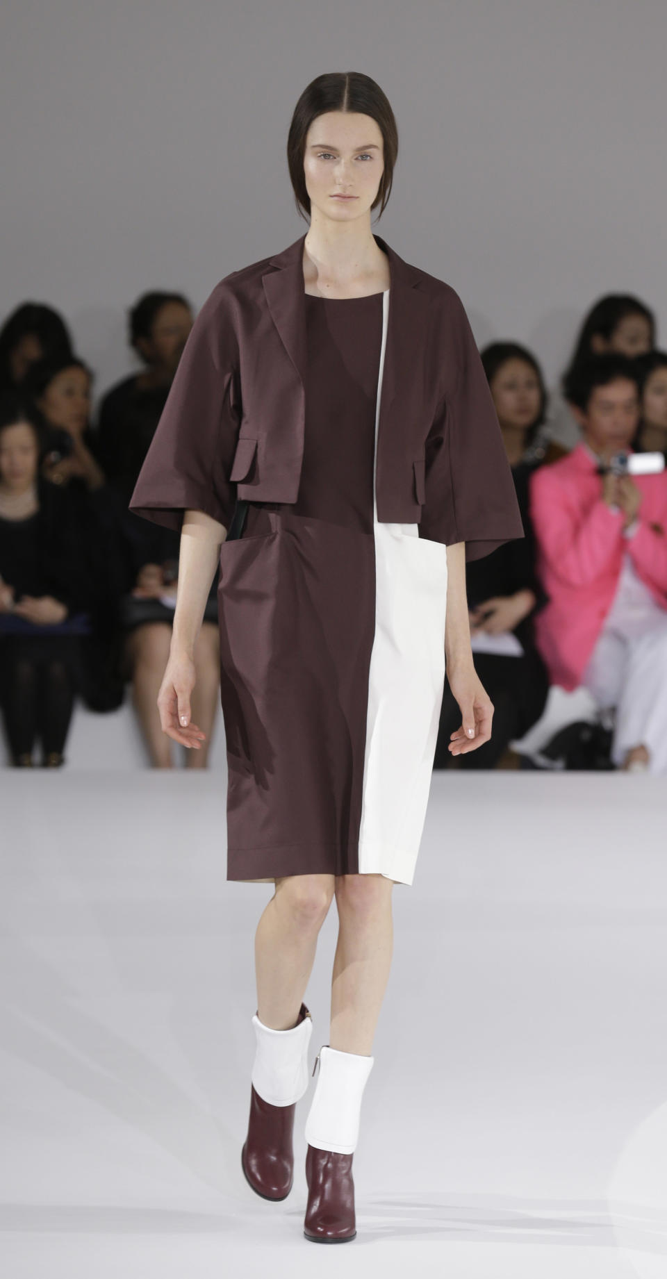 A model wears a creation part of the Jil Sander women's Spring-Summer 2013 collection that was presented in Milan, Italy, Saturday, Sept. 22, 2012. (AP Photo/Luca Bruno)