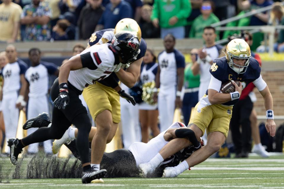 Northern Illinois safety Santana Banner tackles Notre Dame quarterback Riley Leonard during a NCAA college football game between Notre Dame and Northern Illinois at Notre Dame Stadium on Saturday, Sept. 7, 2024, in South Bend.