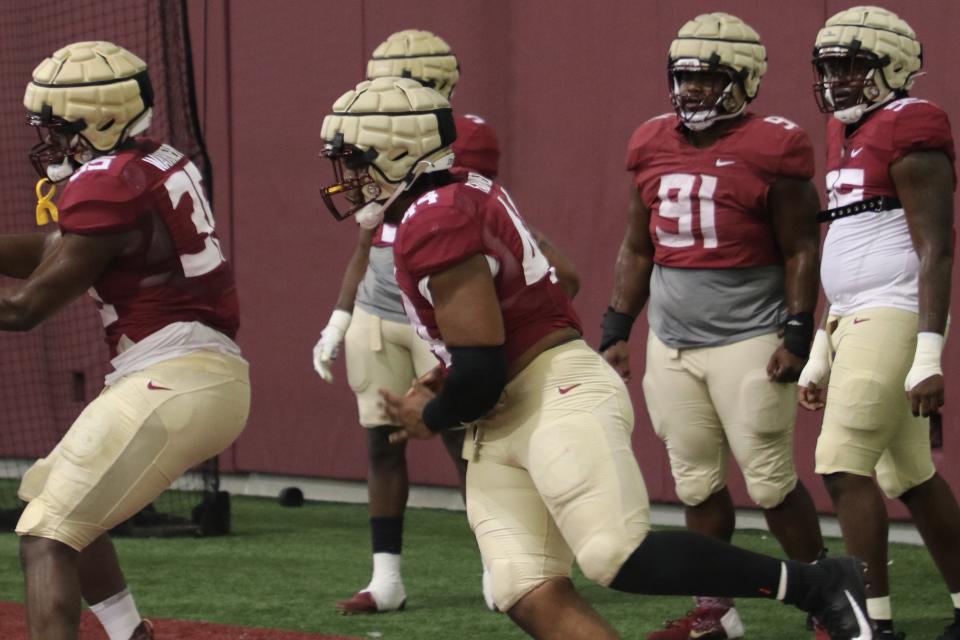 FSU defensive tackle Joshua Farmer goes through a rep during the Seminoles' fourth spring football practice on Friday, March 11, 2022.