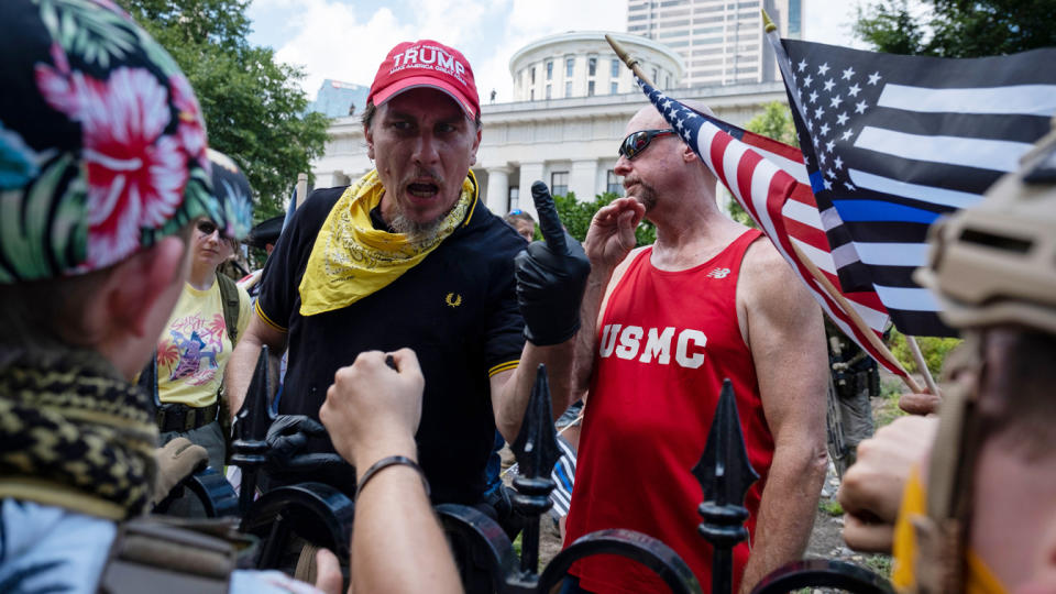 Protestors exchange words and rude gestures in front of the Ohio Statehouse during a right-wing protest "Stand For America Against Terrorists and Tyrants" at State Capitol on July 18, 2020 in Columbus, Ohio. (Jeff Dean/AFP via Getty Images)