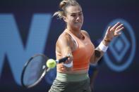 FILE - Aryna Sabalenka of Belarus returns to Anett Liudmila Samsonova of Russia during a WTA tennis tournament match in Guadalajara, Mexico, Wednesday, Oct. 19, 2022. Sabalenka is expected to compete in the season-ending WTA Finals that begin Monday, Oct. 31, 2022, in Fort Worth, Texas. (AP Photo/Refugio Ruiz, File)