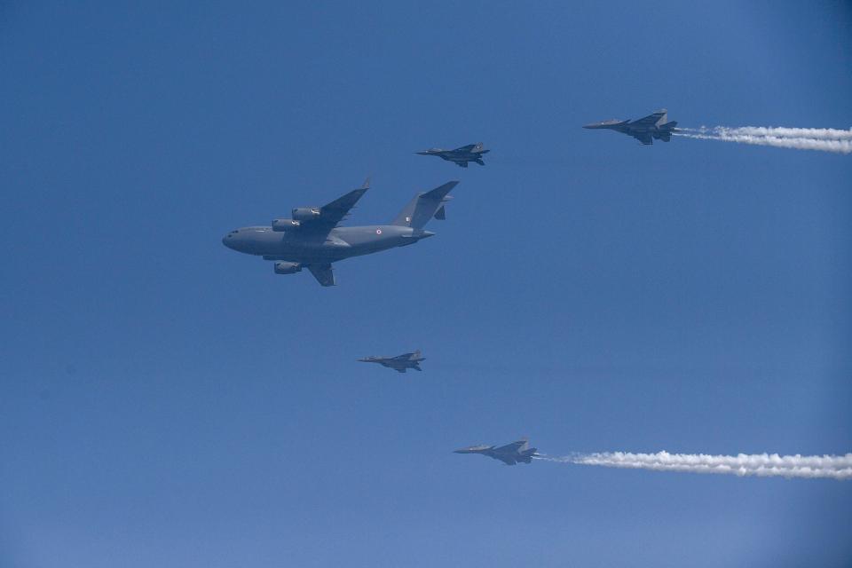 Indian Air Force (IAF) C-17 aicraft (C) flies past during the 88th Air Force Day parade at Hindon Air Force station in Ghaziabad on October 8, 2020. (Photo by Money SHARMA / AFP) (Photo by MONEY SHARMA/AFP via Getty Images)