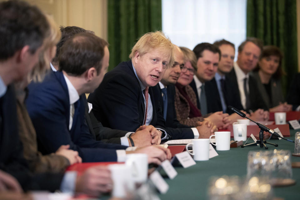 FILE - Britain's Prime Minister Boris Johnson speaks during his first cabinet meeting since the general election, inside 10 Downing Street in London, Tuesday, Dec. 17, 2019. He was the mayor who reveled in the glory of hosting the 2012 London Olympics, and the man who led the Conservatives to a whopping election victory on the back of his mission to “get Brexit done.” But Boris Johnson’s time as prime minister was marred by his handling of the coronavirus pandemic and a steady stream of ethics allegations. (AP Photo/Matt Dunham, Pool, File)