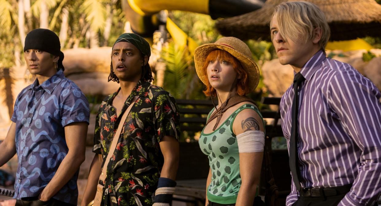  Sanji, Nami, Usopp, and Zoro looking concerned at something off camera. 