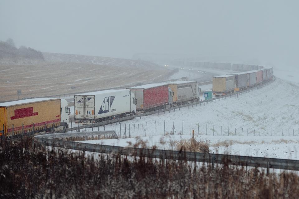 Hundreds of Ukrainian truck drivers stuck in long queues in Slovakia during winter conditions (Anadolu via Getty Images)