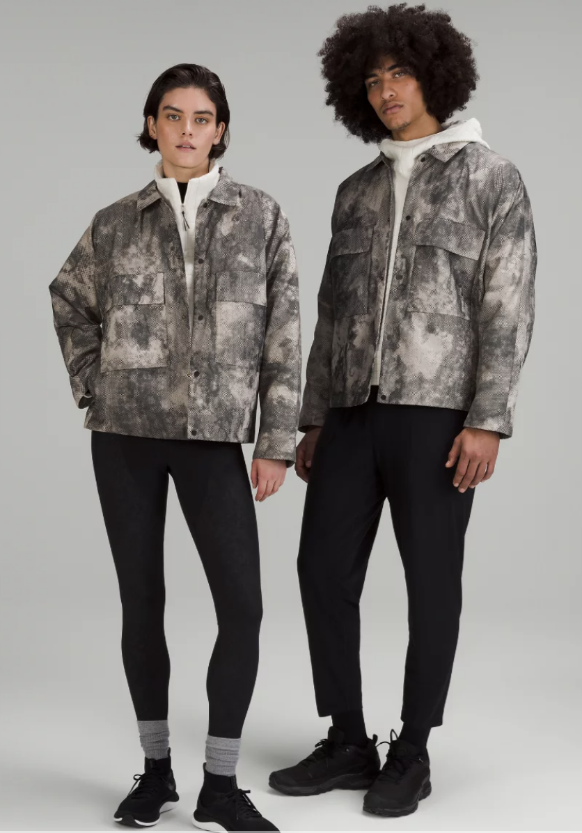 A female and male model wearing the Lululemon lab Lightweight Jacquard Jacket in grey and looking cool.