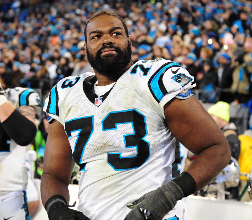 Close-up of Michael in his NFL uniform on the field