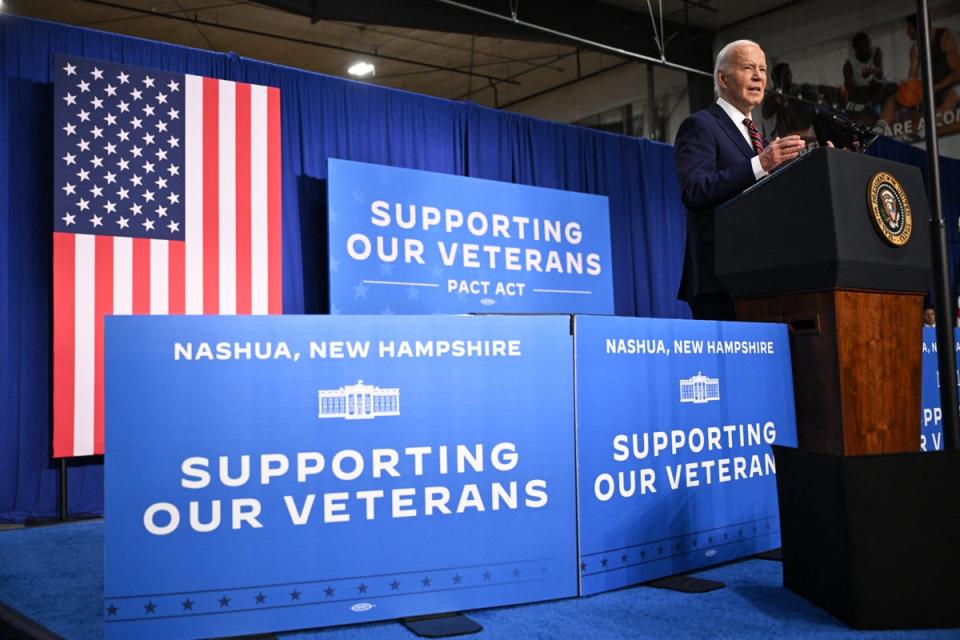 Joe Biden speaks about the PACT Act at a YMCA in Nashua New Hampshire on 21 May (AFP via Getty Images)