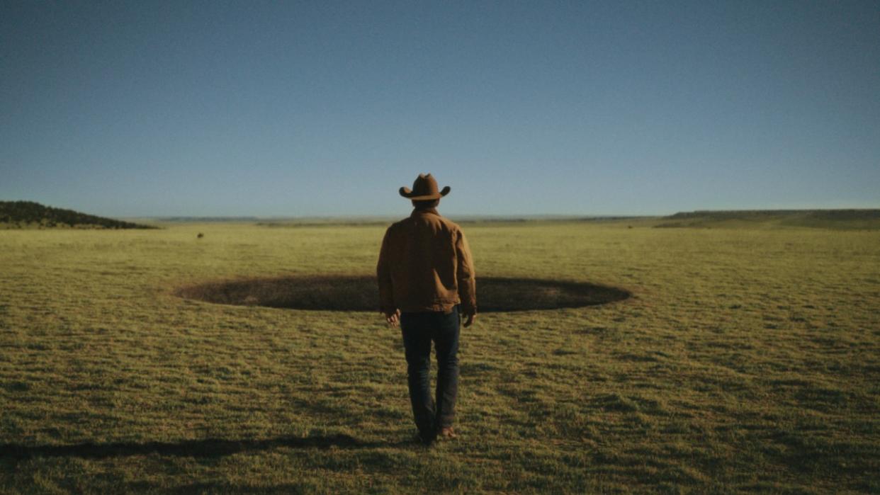  Josh Brolin walking toward the black hole in Outer Range. 