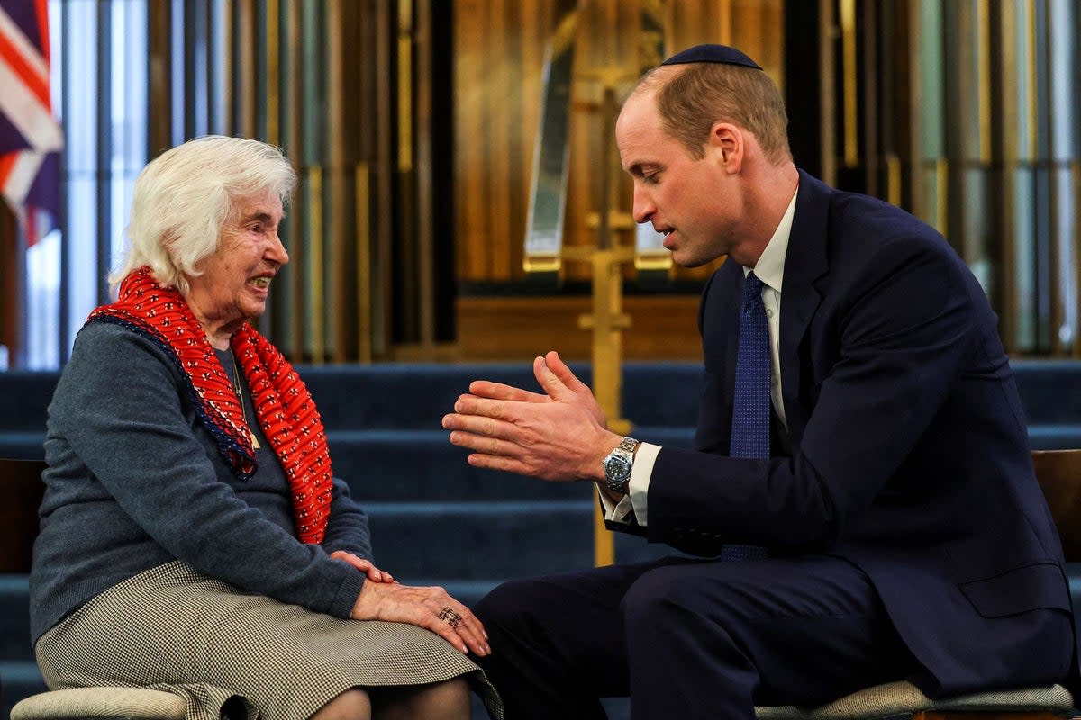 Prince of Wales talks with 94-year-old Renee Salt, a Holocaust survivor  (POOL/AFP via Getty Images)