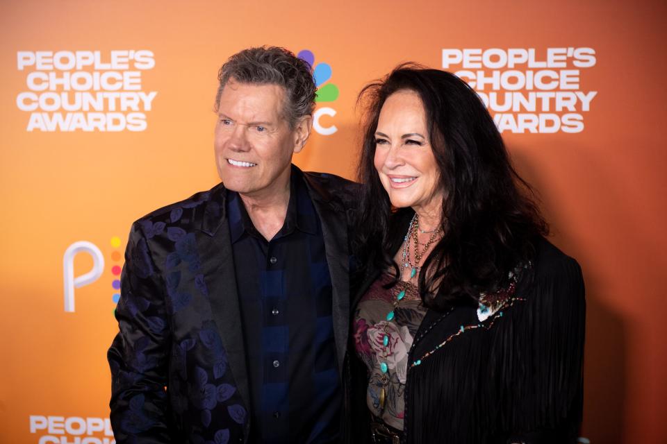 Randy Travis and Mary Travis arrive for the People's Choice Country Awards at the Grand Ole Opry in Nashville, Tenn. on Thursday Sept. 28, 2023.