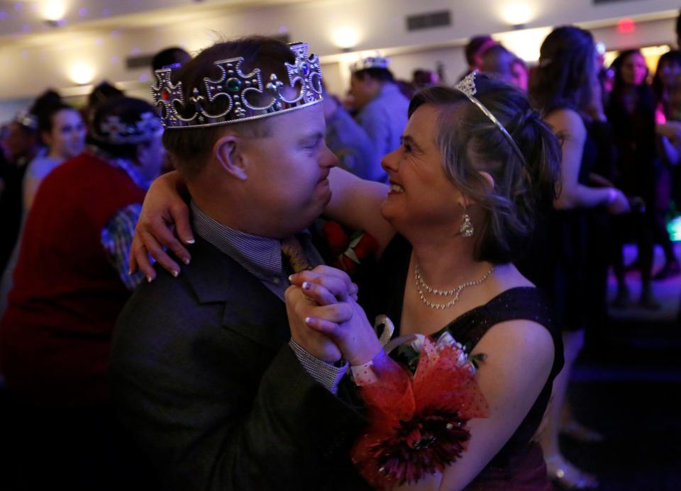 Tiffany Pinkston and John Henning dance during the 2017 "Night to Shine" at Putnam City Baptist Church.