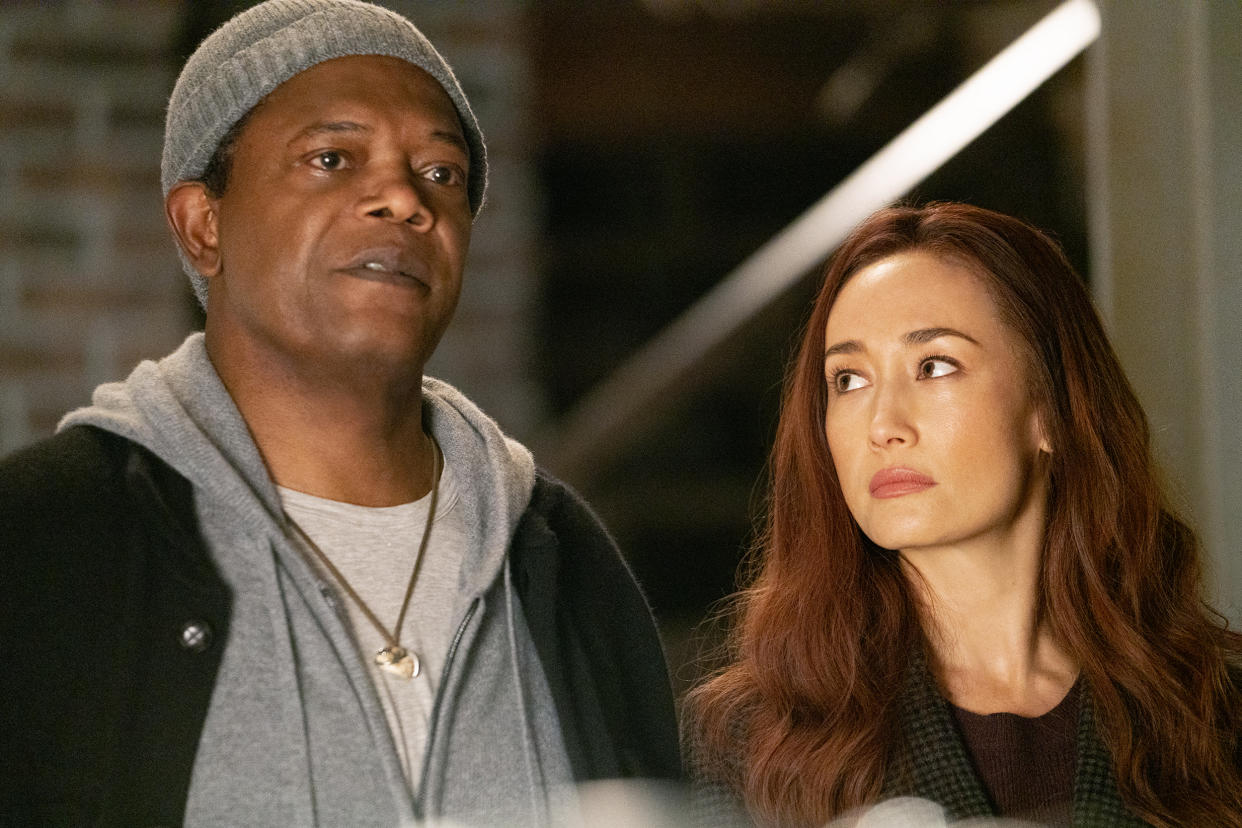 Samuel L. Jackson as Moody and Maggie Q as Anna in 