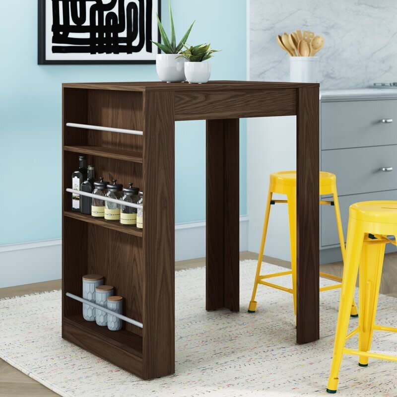 Find this Hedley Pub Table <a href="https://fave.co/2HCPe2b" target="_blank" rel="noopener noreferrer">on sale for $135 (normally $173) at Wayfair.</a>